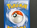 a close up of a pokemon card on a table