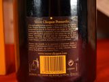 a bottle of wine sitting on a table with a barcode on it