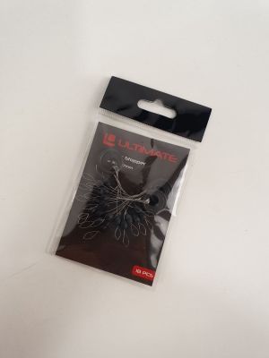a small package of fishing hooks on a white surface