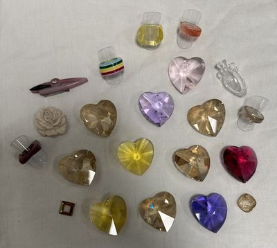 a lot of different colored stones on the table
