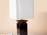an image of a lamp that is on a table