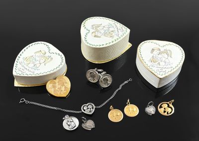 a heart shaped box with many different items in it