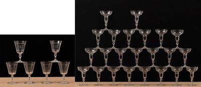 a lot of wine glasses sitting on a table
