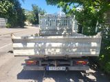 a white truck that is parked on the side of the road