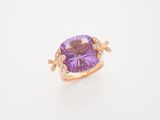 an amethorate and diamond ring set in 18k yellow gold