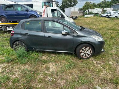 a small car that is parked in the grass