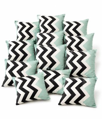 black and white chevrond pillows on a white background