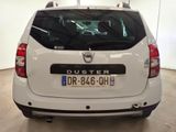 a picture of a white car parked in a showroom