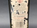 a bottle of wine that is sitting on a table