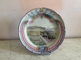 a plate with a picture of a train on it