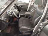 a picture of the interior of a car with the door open