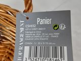 a brown basket with a tag on it that says panier