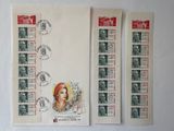 three stamps with a picture of a woman on them on a white surface