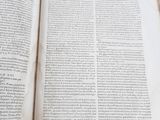 an open book that is sitting on a table
