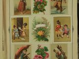 an open book with pictures of children with umbrellas and flowers
