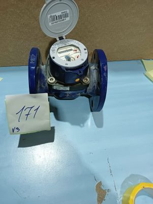 a small blue water meter sitting on a table