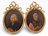 une paire de portraits miniatures représentant un homme et une femme