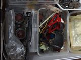 a box full of assorted items sitting on a table