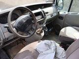 dashboard of a car with a dirty cloth on the floor