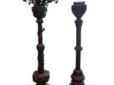 pair of antique bronze candlesticks with birds and flowers on them
