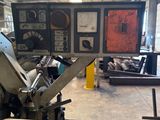a machine that is working on a piece of metal
