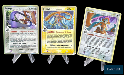 Trois cartes Pokémon différentes sont représentées sur un fond noir.