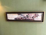 a picture of a painting hanging on the wall