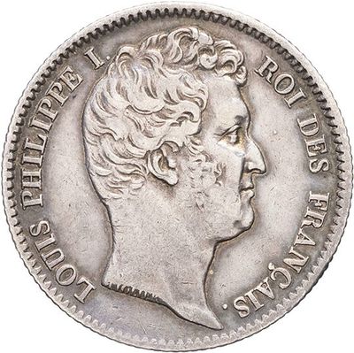 a close up of a coin with a woman ' s face on it