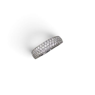 a close up of a diamond ring on a white background