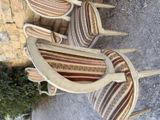 a group of chairs that are sitting on the ground