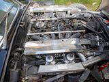 a car engine that is sitting in the trunk of a car