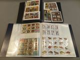 a lot of stamps on the pages of a book