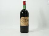 a bottle of wine that is sitting on a table