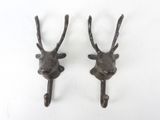 pair of antique cast iron deer head hooks