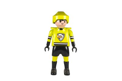 un gros plan sur une figurine Lego représentant un homme en uniforme jaune