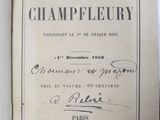 an old book with a black and white image of the title of a book