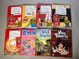 plusieurs livres pour enfants sont alignés sur une surface blanche