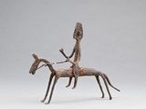 statue représentant une femme à cheval, avec un homme sur le dos