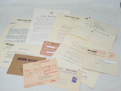 a lot of papers that are on a table