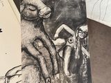 a drawing of a woman and a bear on a table