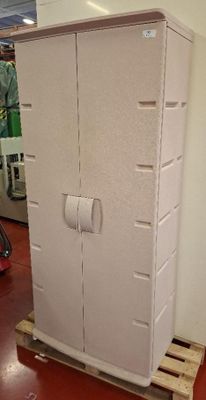 a white refrigerator sitting on a pallet in a store