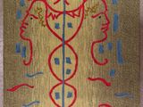 une image représentant une peinture d'un serpent et un serpent sur un morceau de tissu