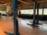 a picture of a garage with a lot of equipment in it