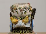 a figurine that is sitting on a table
