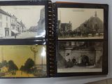 an old black and white photo of a book with pictures on it