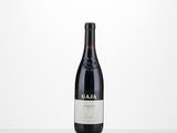 a bottle of wine that is sitting on a table