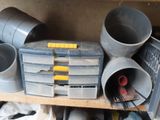many different types of pipes and buckets sitting on a shelf