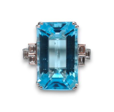 an aquamarinee and diamond ring