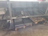 a rack with many different types of metal items on it