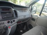 a dashboard of a car with a clock on it